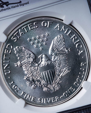 1987 Silver Eagle | MS69 Reverse Struck Thru | John Mercanti Autographed