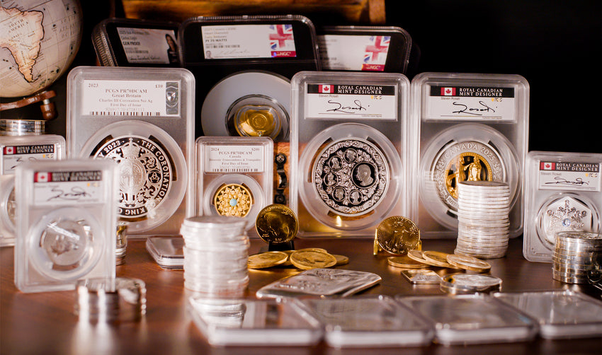 A variety graded coins in protective cases