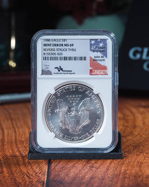 1986 Silver Eagle Mint Error MS69 Reverse Struck Thru
