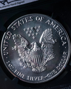 1990 Silver Eagle | MS69 Reverse Struck Thru | John Mercanti Autographed