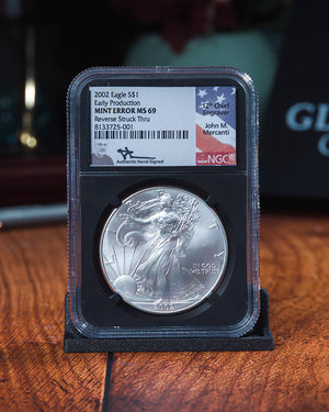 2002 Silver Eagle | Early Production Mint Error MS69 Reverse Struck Thru | John Mercanti Autographed